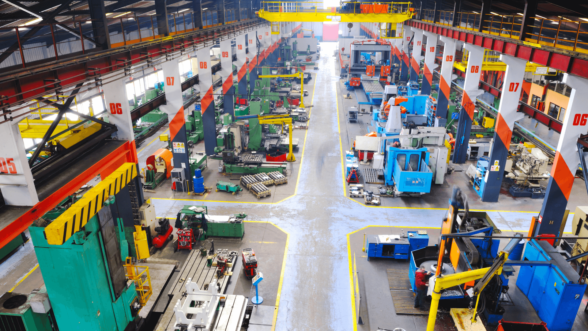 This factory floor could have improved efficiency with a real-time data solution. Which solution would be best? MES vs IoT?